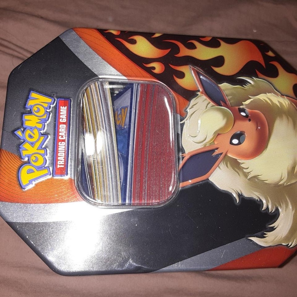 Pokemon Trading Card Tin - Black, Orange, and Silver